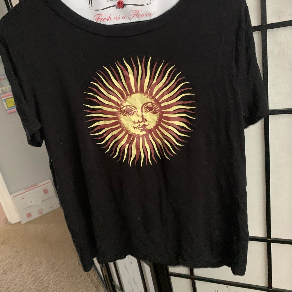 Black shirt with sun